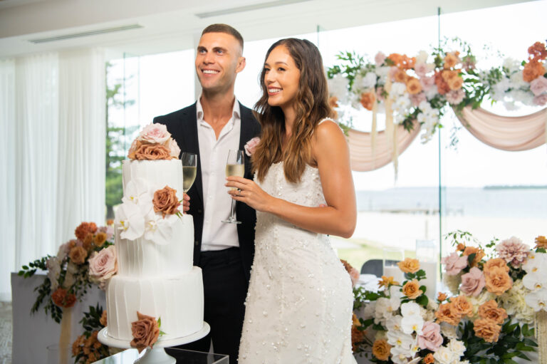 Couple cutting the cake at Georges River Sailing Club